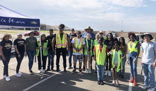 A plethora of volunteers, staff, and students gave up their time last week to help out with the latest West Hills College Lemoore drive-thru grocery distribution.